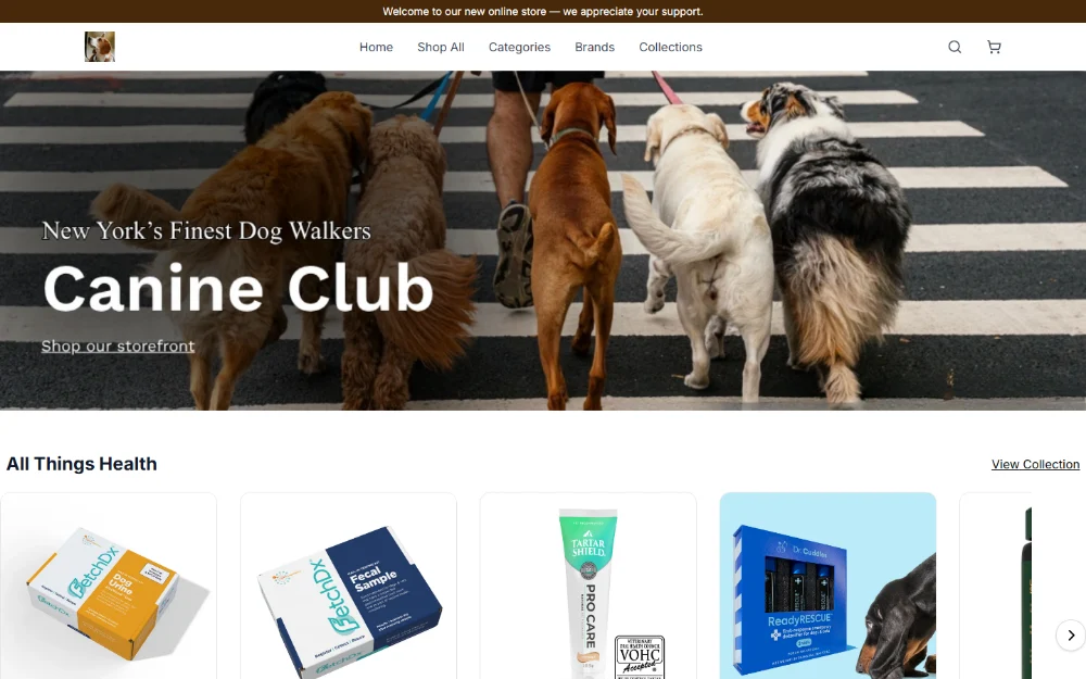 The Canine Club storefront, a photograph of dogs on a crosswalk above a row of health products